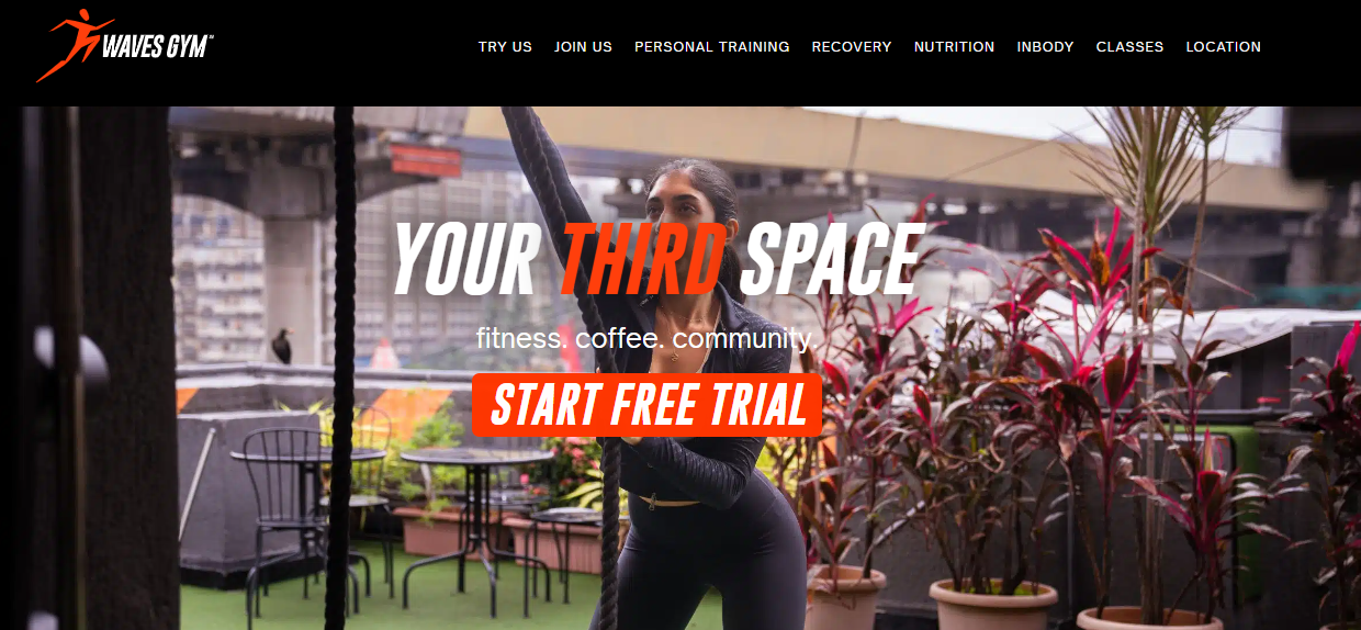 Waves Gym website hero with bold CTA and vibrant gym visuals.